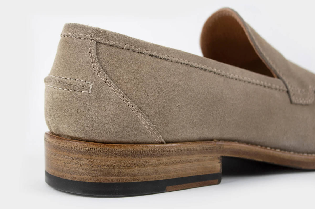 Heel of a bespoke shoe fitted to prevent heel slippage