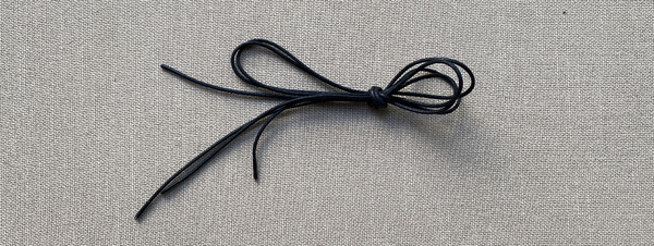How are quality shoe laces for men's dress shoes made?