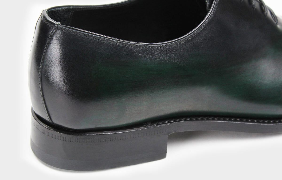 Bondeno Bruno bespoke wholecut Oxford in hand-painted pine green calfskin, close-up of the heel