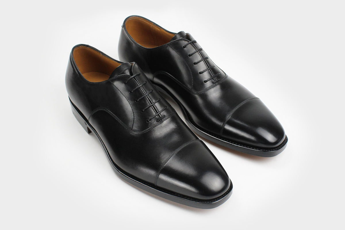 Bondeno Mauro bespoke cap-toe Oxford in black calfskin, pair, three-quarter view from above